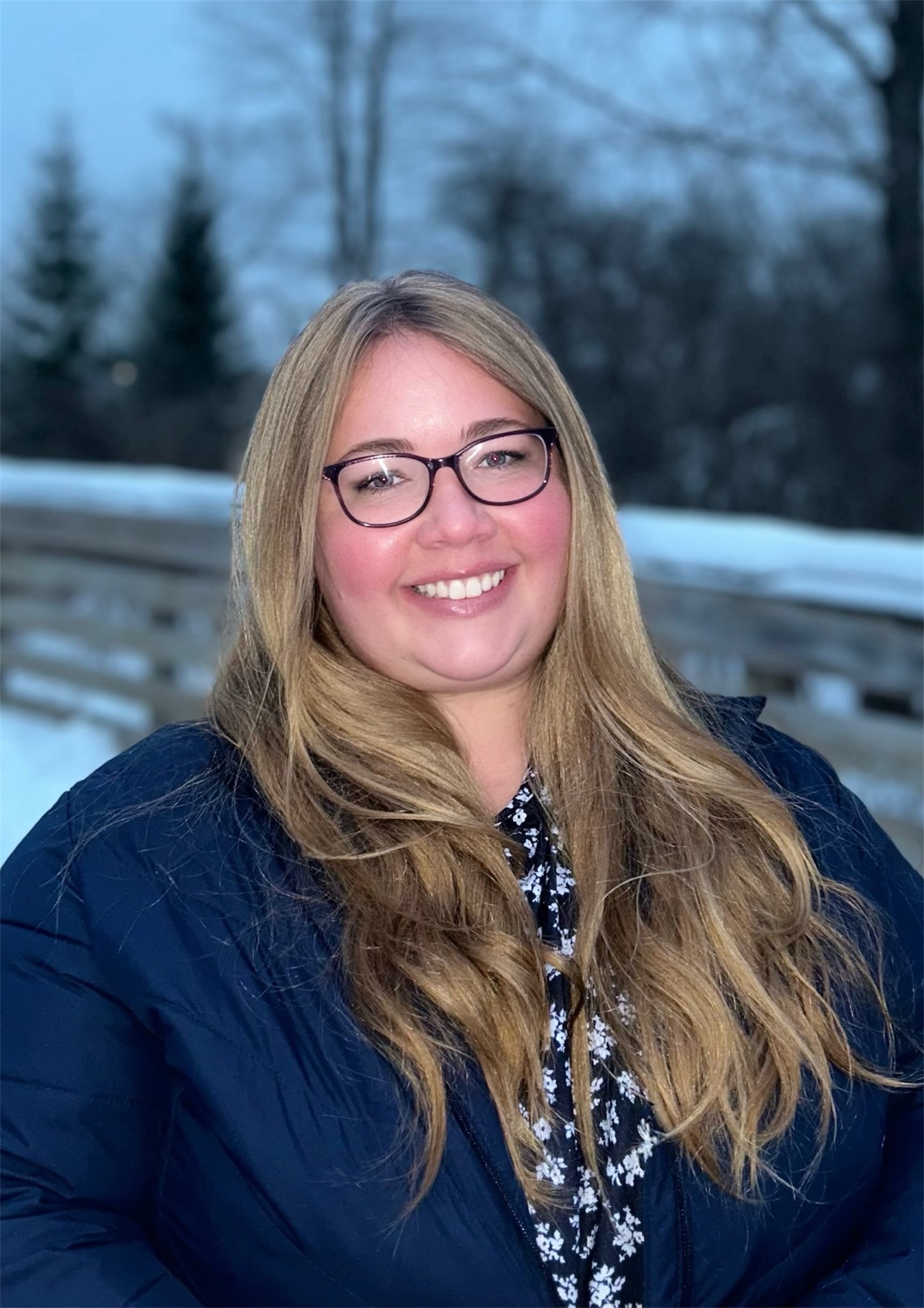 Cortney Peterson smiling on a snowy bridge in Ohio, December 2025